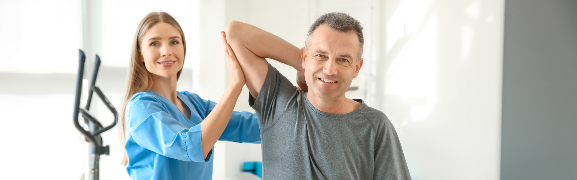 Man with nurse doing exercise.