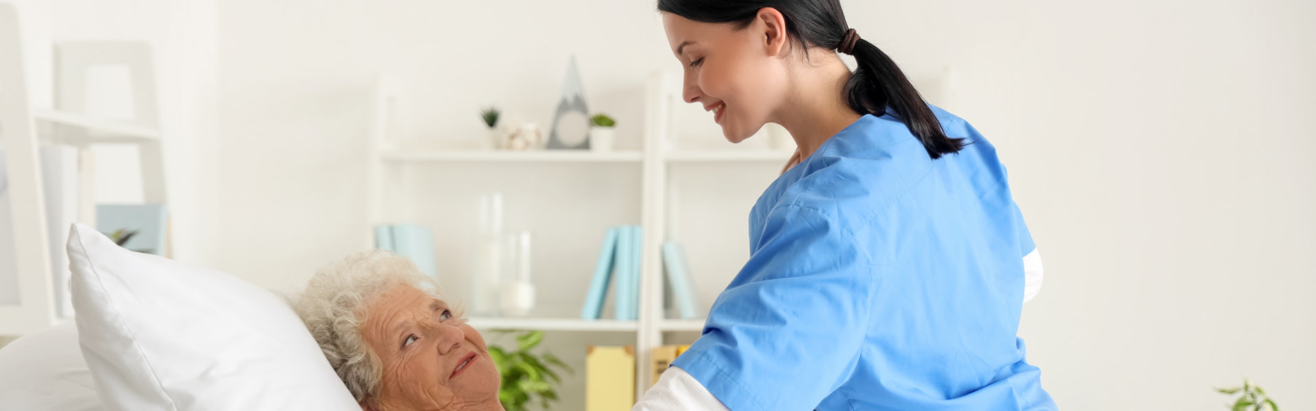 Nurse taking care of woman in the room.